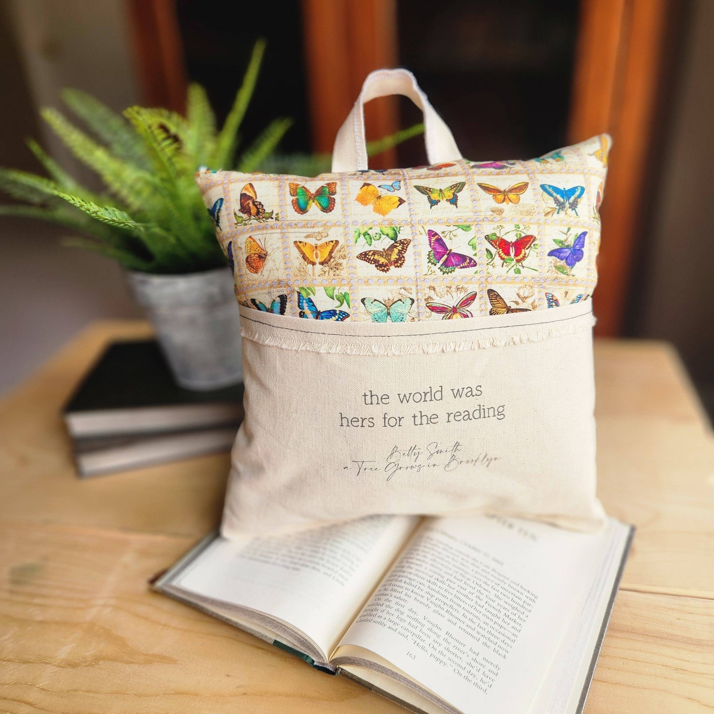 The World was Hers... Reading Pillow with Butterflies