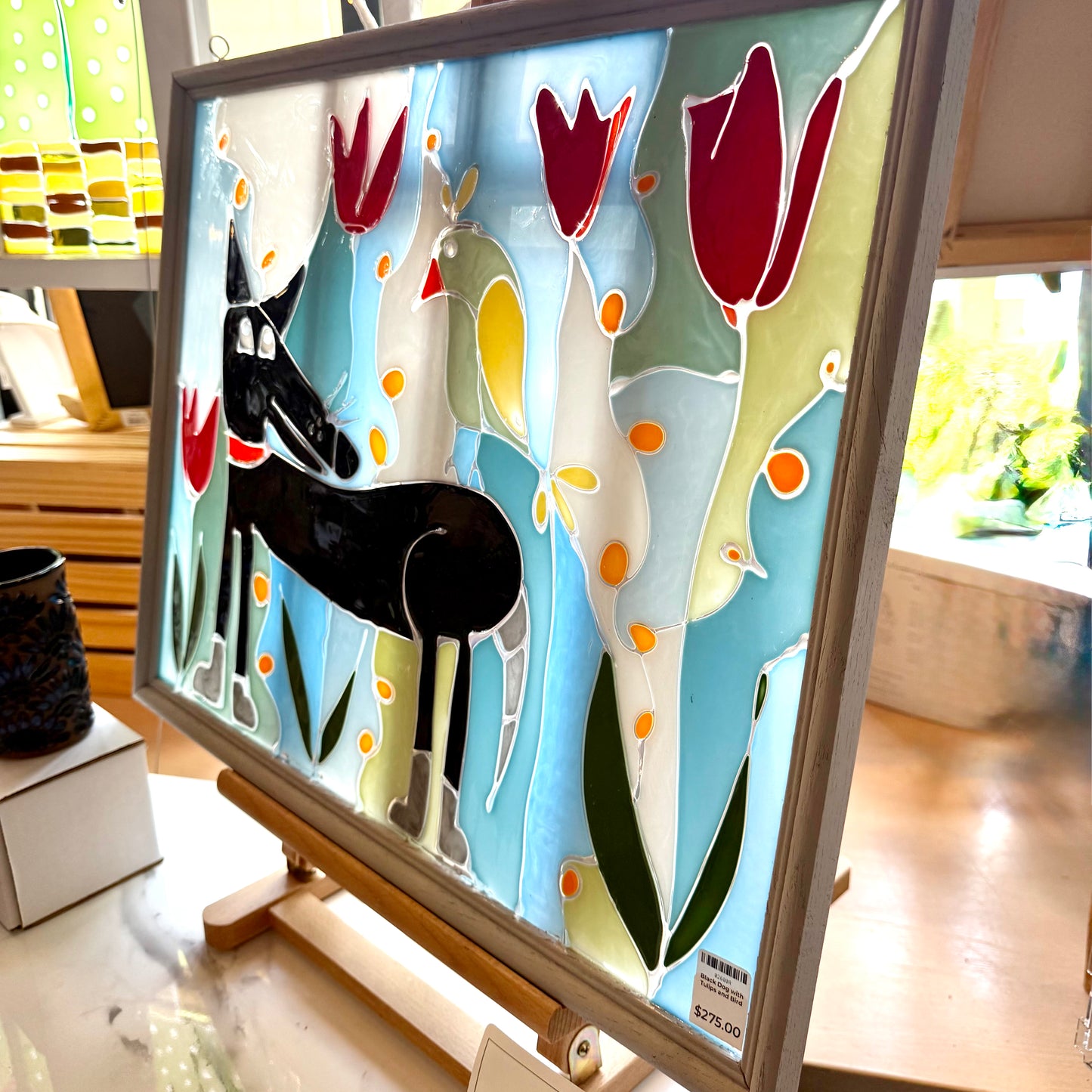 Black Dog with Tulips and Bird